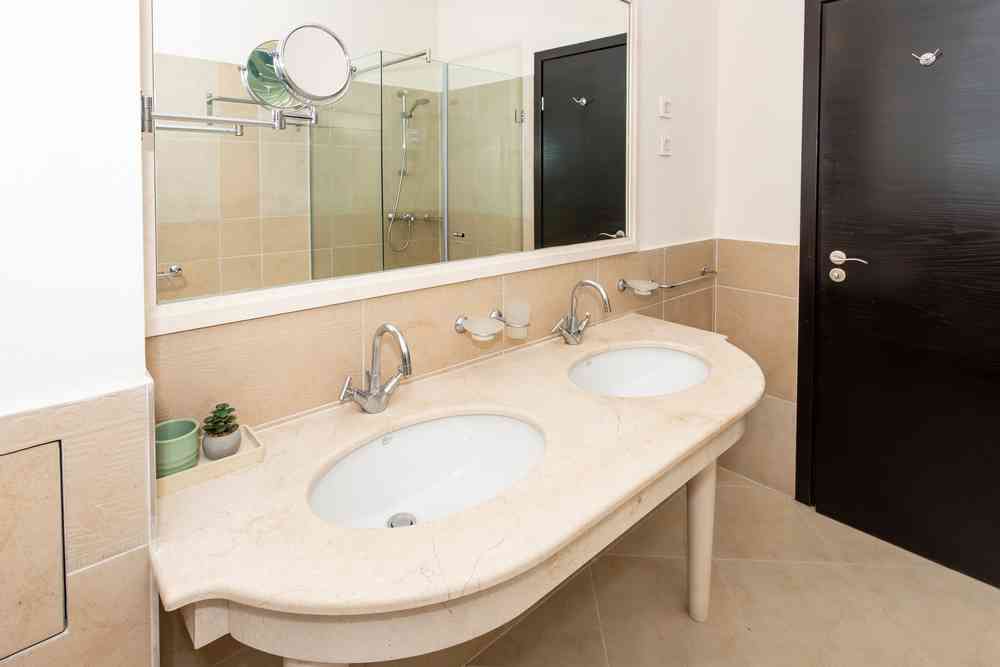 Double vanity with marble countertop