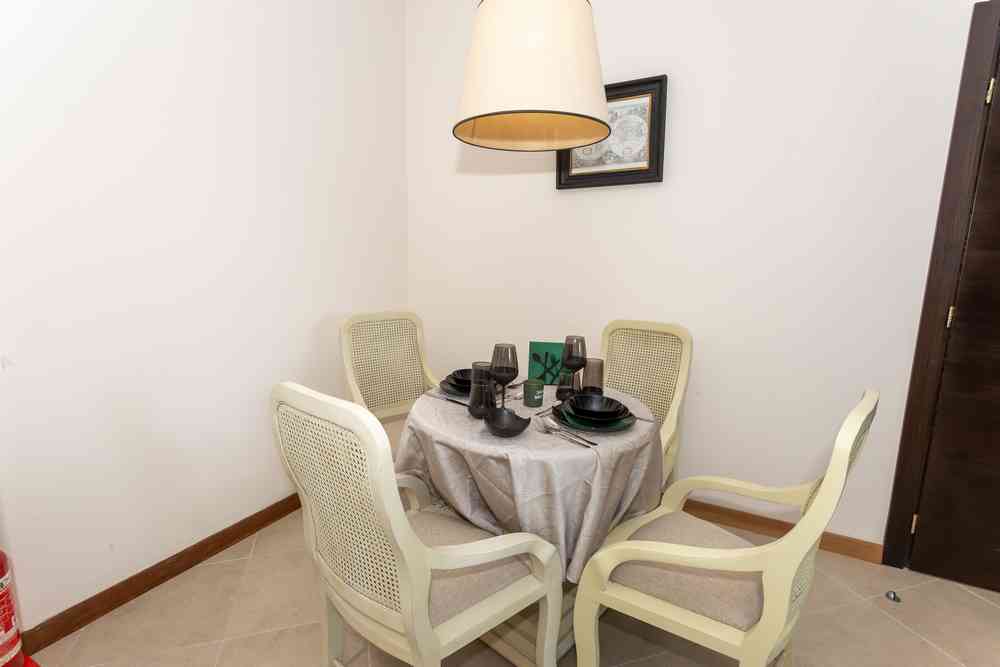 Dining table set for four